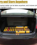 Top Shelf Fiberglass Telescoping Extension Ladder With A Secure Built In Hook And Fully Adjustable Sections stored compactly in a car trunk.