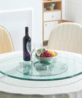 Extra Large Clear Glass Lazy Susan Turntable Smooth Rotating Serving Tray with wine, glasses, and fruits on dining table.