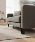 Sturdy Black Plastic Sofa Feet With Screws Replacement Legs elevate a grey couch for easy floor cleaning and clear sweeping access.