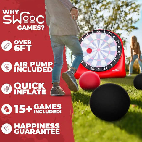 Person playing with Inflatable Giant Kick Darts Set With Jumbo Soccer Dartboard and air pump outdoors, featuring two balls.
