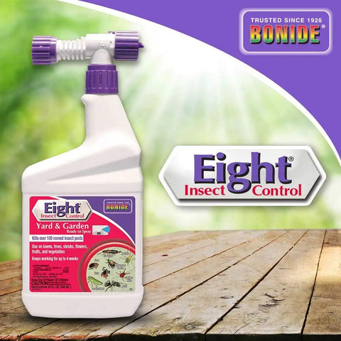 Eight Insect Control Yard And Garden Ready To Spray 32 Oz long lasting insecticide bottle on a wooden surface with green background.