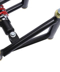 Close-up of Front Suspension Swingarm Assembly Upgrade Kit with shocks and swingarms for DIY ATV Quad Bike Buggy Go Kart Parts.