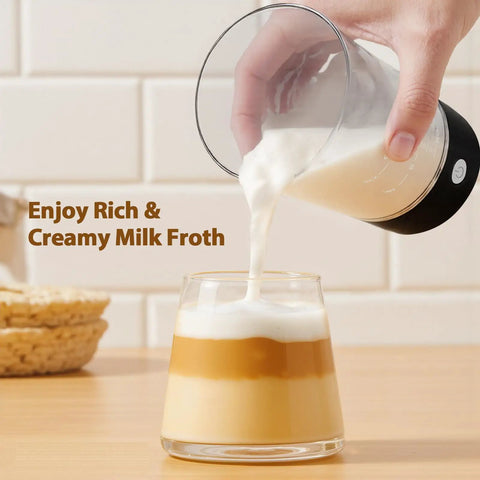 Handheld Cold Foam Frother For Coffee Battery Powered With Two AA One Button Operation pouring foam into coffee