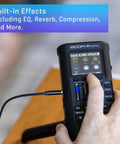 Close-up of Zoom R4 MultiTrak Recorder with built-in effects controls for Ready To Roll 32 Bit Float MultiTrak Recorder And Stereo Bouncing Bundle Featuring Podcast Dynamic Microphone Padded Headphones Heavy Duty Tripod Acoustic Windscreen And Xlr Cable For Tracking Like A Pro.