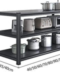 Kickass Three Tier Metal Shelving Unit Freestanding Steel Storage Rack With Heavy Duty Construction And Slick Black Finish Perfect Tight Setup For Garage Kitchen Office Or Restaurant Warehouse Organization 120X40X80CM with kitchen appliances arranged on shelves.