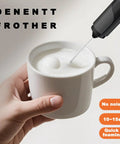 Handheld Milk Frother With Cover, 15 Second Silent Drink Mixer, in use foaming milk in a white mug