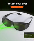 Top Notch Fiber Laser Safety Goggles For 1064Nm Eye Protection And Laser Engraving Gear displaying in-use with green laser beams.