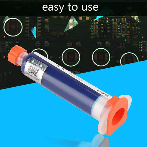 Syringe of DIY Friendly UV Curing Solder Paste for PCB Repairs, Non Clean Flux, orange cap, circuit board background, easy to use