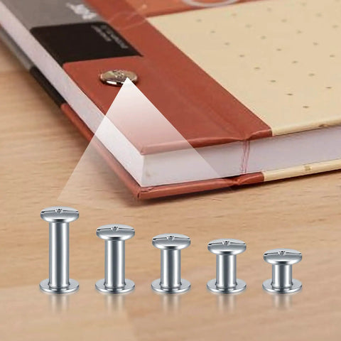 Hella Durable 160 Piece Chicago Screw And Binding Post Set Crafted For Heavy Duty Leather Projects And Photo Book Binding Featuring M4 M5 Size Compatibility With Anti Rust Nickel Finish displayed next to a notebook.