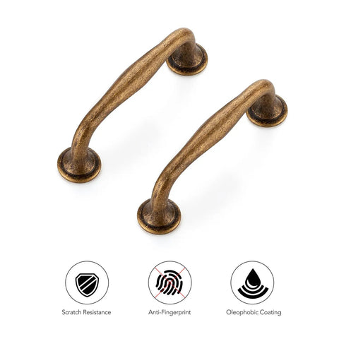 Built Tough Heavy Duty Antique Brass Cabinet Pulls 3 Inch Drawer Handles 10 Pack For Kitchen Solid Metal Furniture Knobs close-up view.