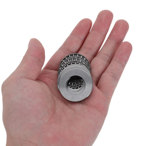 High Strength Thrust Needle Roller Bearings With Washers Set Of 4 Steel Flat Needle Roller Bushings in hand, precision industrial grade.