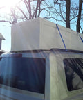Vehicle carrying large box secured with Premium Ratchet Tie Down 1 Inch By 16 Feet With Rubber Coated S Hooks, 1000 Lbs Working Load