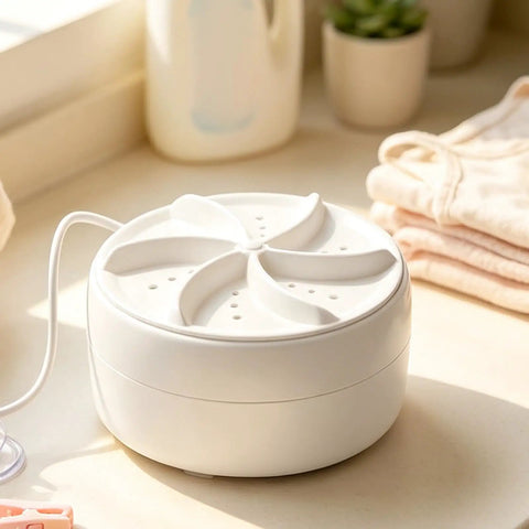 Portable Mini Turbo Washer Compact Automatic Laundry Beast For Dorm Rooms And Apartments Travel Friendly Design That Slaps With Rapid Spin Cycle on a table.