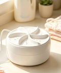 Hella Compact Turbo Portable Washer For Clothes And Socks Ditch The Laundromat Stress Rad Mini turbine spin cycle in white.