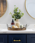 Rad Five Inch Brushed Gold Cabinet Pulls And Drawer Handles on blue cabinetry in an elegant bathroom setting.