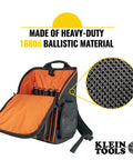 Heavy Duty Jobsite Ready Workhorse Tool Backpack With 21 Pockets And Large Interior Water Resistant 1680D Ballistic Weave Quick Front Access Zipper For Tools Work Light Loop Durable Organizer For Electricians And Builders, showing orange interior and material detail.