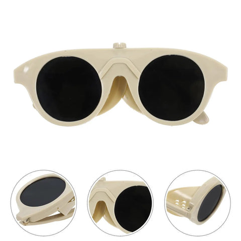 High Grade Welding Goggles And Safety Glasses Featuring Adjustable Impact Resistant Lenses For Gas Arc Cutting Grinding Hardcore Shop Job Crew Approved Must Have Gear with beige plastic and dark lenses.
