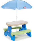 Six Seat Kids Picnic Table With Umbrella Multi Color Outdoor Play Table With Center Cup Holders And Crayon Tray No Tools Needed To Set Up 200 Lb Per Bench Durability For Backyard Fun, showcasing a blue and green table with a blue umbrella.