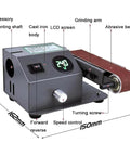 Solid Workhorse Bench Belt Sander And Electric Knife Sharpener With Variable Speed To 13000Rpm, showing LCD screen, grinding arm, and abrasive belt.