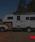 No Sweat Heavy Duty Trailer Axle Conversion And Lift Kit For 3500 Lb Trailers with trailer attached to truck outdoors.