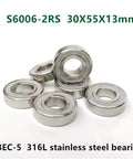 10 Pack S6006 2RS 316L Marine Grade Stainless Steel Deep Groove Ball Bearings 30 X 55 X 13 Millimeter stacked in view.