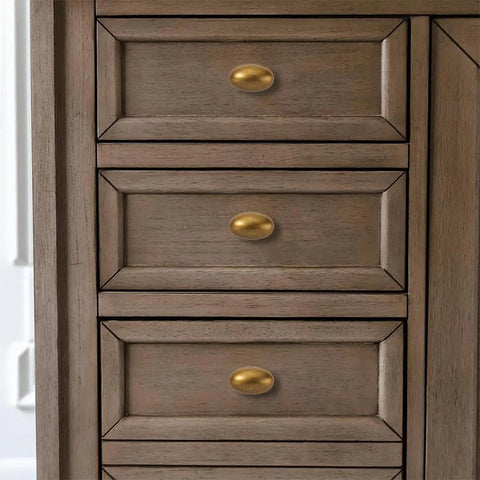 Antique Brass Cabinet Knobs 10 Pack 1-3/8 Inch Oval Drawer Knobs installed on wooden cabinet drawers