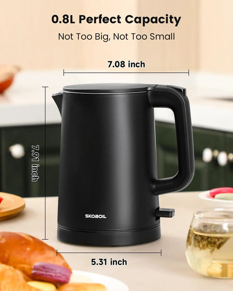 Compact Electric Kettle For Tea And Coffee 0.8L 27 Oz Double Wall Stainless Steel Space Saving Mini Hot Water Heater shown on kitchen counter
