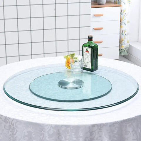 Large Round Lazy Susan Turntable Glides Smooth As Butter Dual Plate Connection Heavy Duty Tempered Glass Serving Tray on dining table.