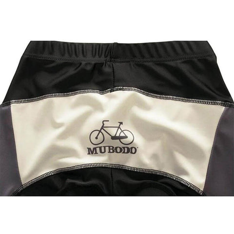Close-up of Muboddo cycling shorts with logo and bicycle graphic, showing back detail in black and beige fabric.