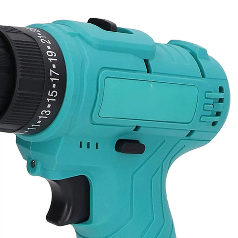 Heavy Duty Cordless Drill With Dope Torque And High Speed Rotation For Wood Aluminum Steel angled close-up of handle and chuck.