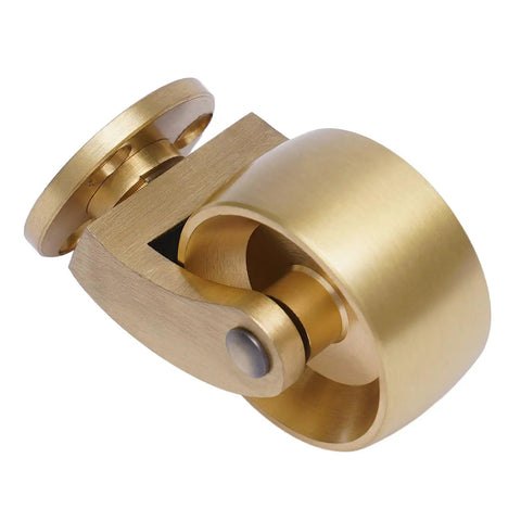 Close-up of a Super Sturdy Universal Brass Caster, 360-degree swivel wheel, polished brass, supports heavy furniture.