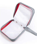 Open Slick Hard Plastic CD Case With Secure Slim Zipper Stores Forty Eight Discs Waterproof And Tough As Nails, showing storage pockets.