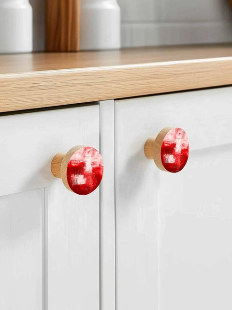Solid 2 Piece Round Cabinet Knobs Crafted From Fine Beech Wood With Abstract Oil Painting Finish on kitchen cupboard.