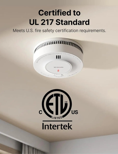 Real Deal 10 Year Smoke Detector With Photoelectric Sensor And Sealed Lithium Battery That Squashes False Alarms And Keeps Your Whole House Locked In Safe From Kitchen Smoke And Steam mounted on ceiling with certification logo.