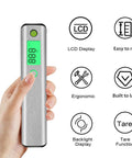 Solid As A Rock Digital Trigger Pull Scale Gauge For Reliable Peak Force Testing With Hella Precise Readings And A Rugged Stainless Steel Body Built For Pro Bench Work held in hand, LCD display, ergonomic design