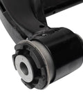 Slick Front Steering And Suspension Repair Kit Bringing Heavy Duty Lower And Upper Control Arms With Ball Joints Inner And Outer Tie Rods Plus Sway Bar Links For Street Use close-up of control arm bushing and joint.