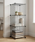 20 Grid Wire Mesh Storage Organizer With Interlocking Cube Panels For Tool Sorting Gear Tidy And Closet Makeovers Black Rack with plants and books.