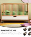 Vintage Brass Caster Set Offering Heavy Duty Swivel Furniture Wheels on a baby crib for easy movement across floors.