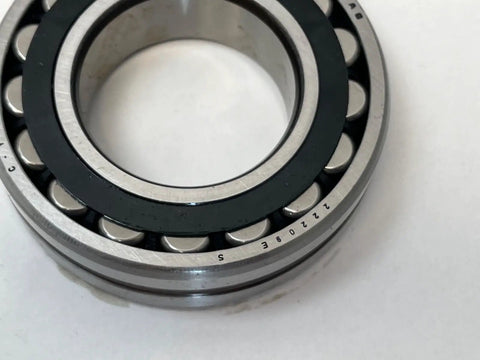 Heavy Duty Spherical Roller Bearing 22209ES TVPB W33 45X85X23MM with polyamide cage and smooth finish, ideal for industrial use.