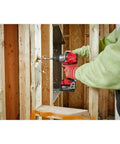 Half Inch Compact Cordless Drill Driver Kit Featuring Rock Solid Metal Chuck And Carbide Teeth For Ultimate Bit Retention drilling into wood.