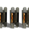 Three Pack Heavy Duty Concealed Door Hinges Offering Smooth Hydraulic Cushioning And Built Tough Brass Craftsmanship For Zero Drama Setup And Bulletproof 180 Degree Swing Plus Reliable 100 Kilogram Load Holding In Cool Grey displayed from the front with orange cushioning visible.