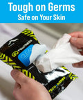 Person using To Go Tech Wipes 25 Count Skin Safe Electronics Cleaning Wipes For Screens Phones Tablets Laptops Keyboards Monitors Travel Size