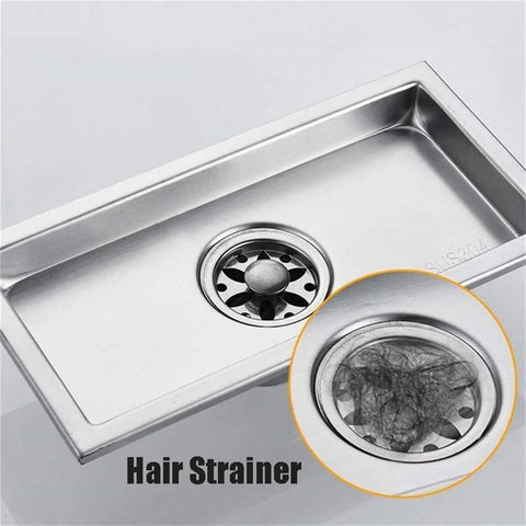 Top Shelf Rectangular Linear Shower Drain In Rust Resistant 304 Stainless Steel With No Sweat Hair Catcher Grate Slick Gold Tone 10X60CM showing a close-up of the hair strainer.