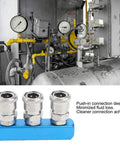Industrial setup with push in connection design C type air compressor quick connector on blue base, close-up view
