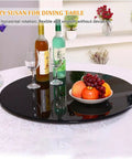 Heavy Duty Tempered Glass Lazy Susan Rolls Smooth With 360 Swivel, Giant Round Turntable Plate for dining table with fruits and drinks.
