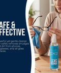 Ultra Clarity lens cleaner spray bottle with blue label beside glasses and a blue microfiber cloth.