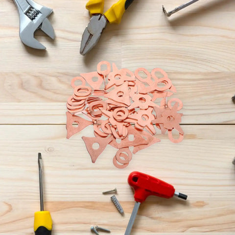 Dent Puller Rings Kit 50 Piece Multifunctional Auto Body Tool Set Made Of Iron with scattered tools on wooden surface