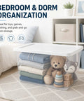 Super Spacious 58 Quart Clear Storage Bins With Easy Snap Lids Heavy Duty Stackable Plastic Organizer Boxes For Closet And Pantry Total Game Changer Vibe filled with toys and folded clothes.