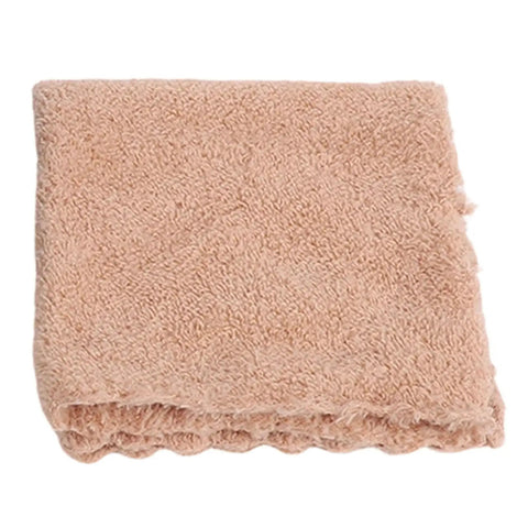 Top Tier Mini Bench Grinder With Versatile Grinding Wheels And A Rock Solid Copper Motor That Knocks Out Polishing Rust Removal And Sharpens Hand Tools Like A Dream - soft beige towel for cleaning and polishing.