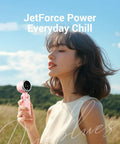 Woman holding Portable Handheld Turbo Fan With 5 Gear Wind, Battery Operated, Up To 12 Hours Run Time in a field